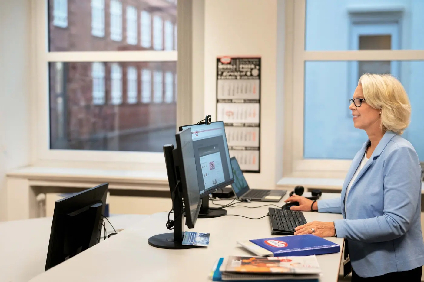 Picture - Person working at a computer in an office