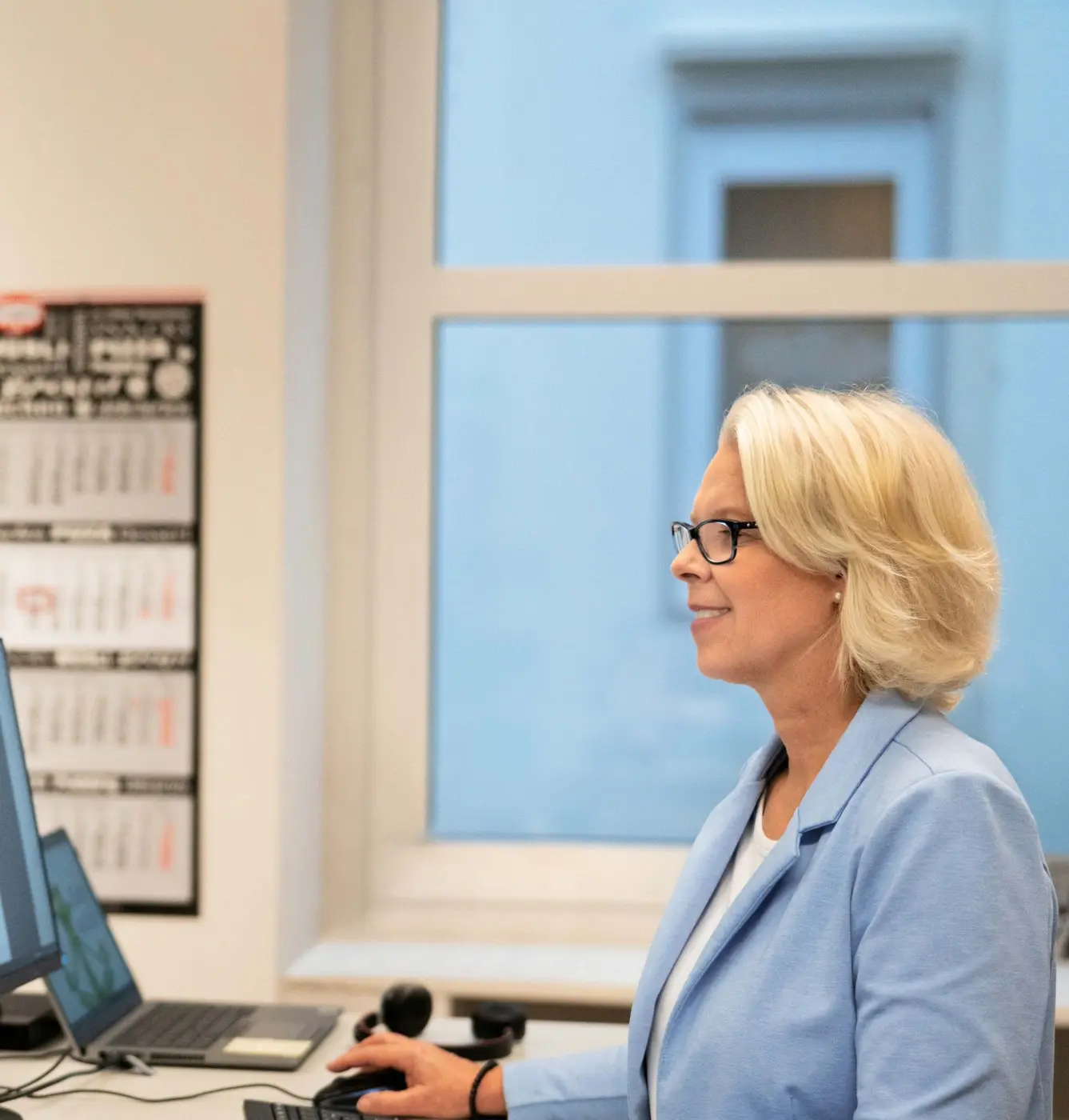 Picture - Person working at a computer in an office